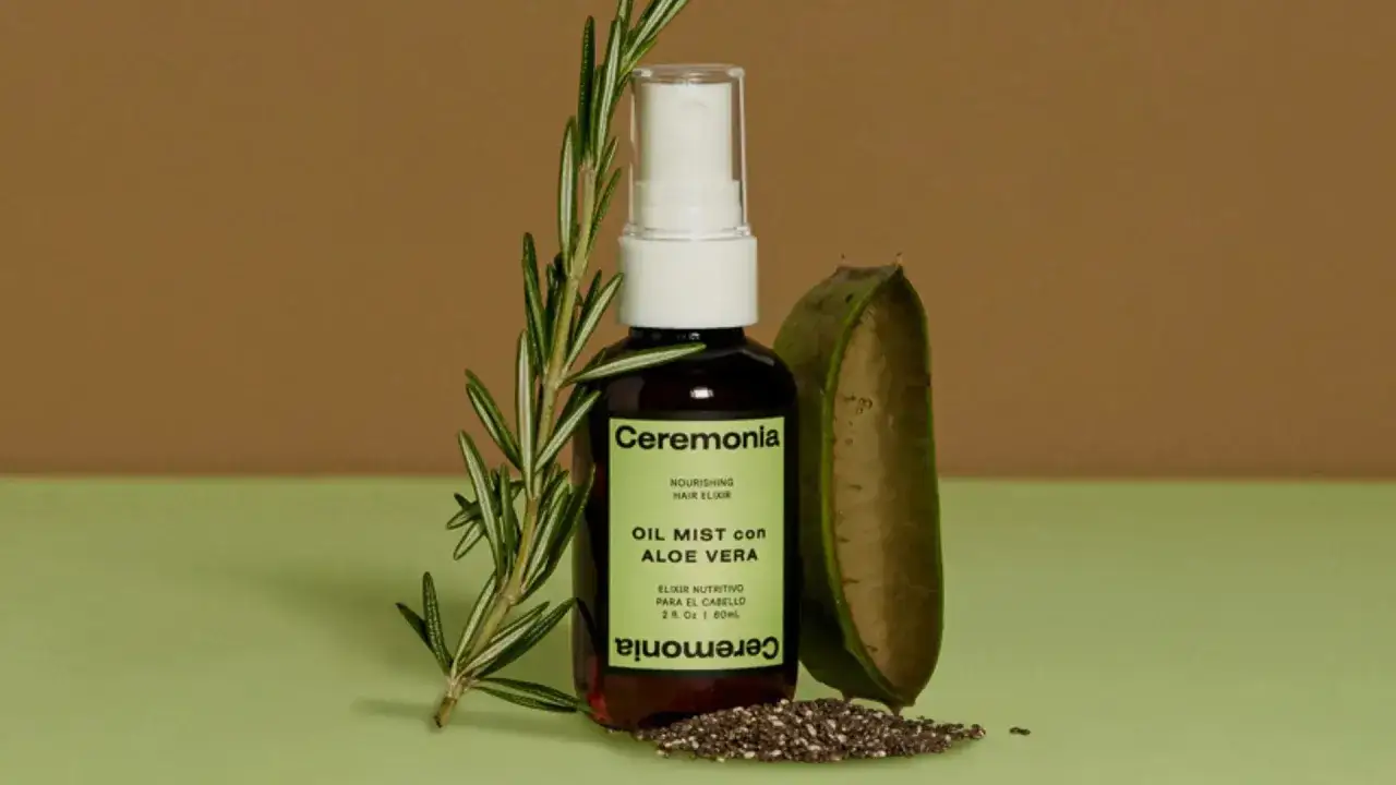 Flacon d'huile pour cheveux &agrave; l'aloe vera, avec romarin et une gousse d'aloe vera. Id&eacute;al pour le cuir chevelu.